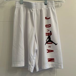 Boys white Jordan mesh basketball shorts size medium